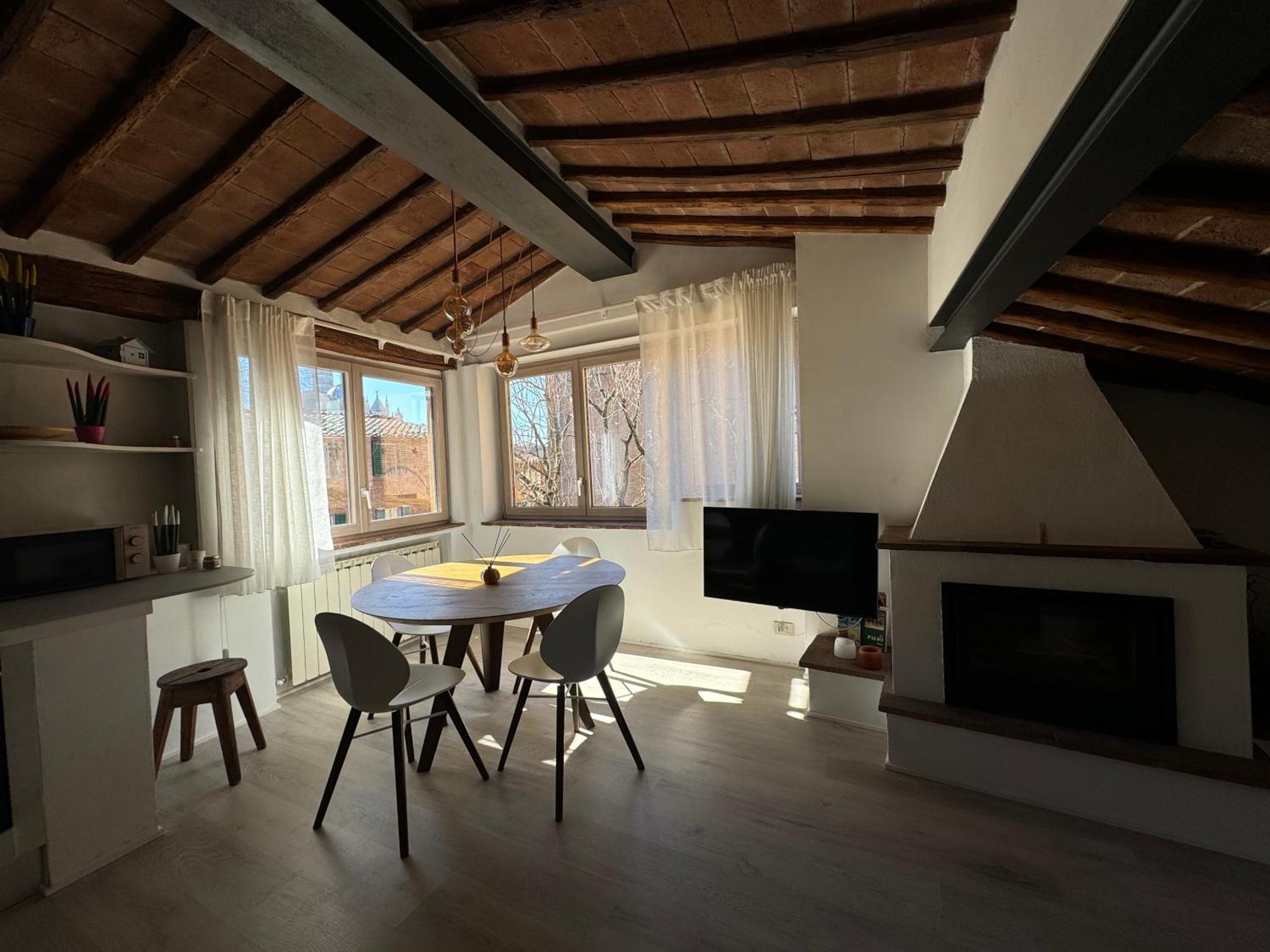 Teresa 91, appartamento incantevole con camino Siena Esterno foto