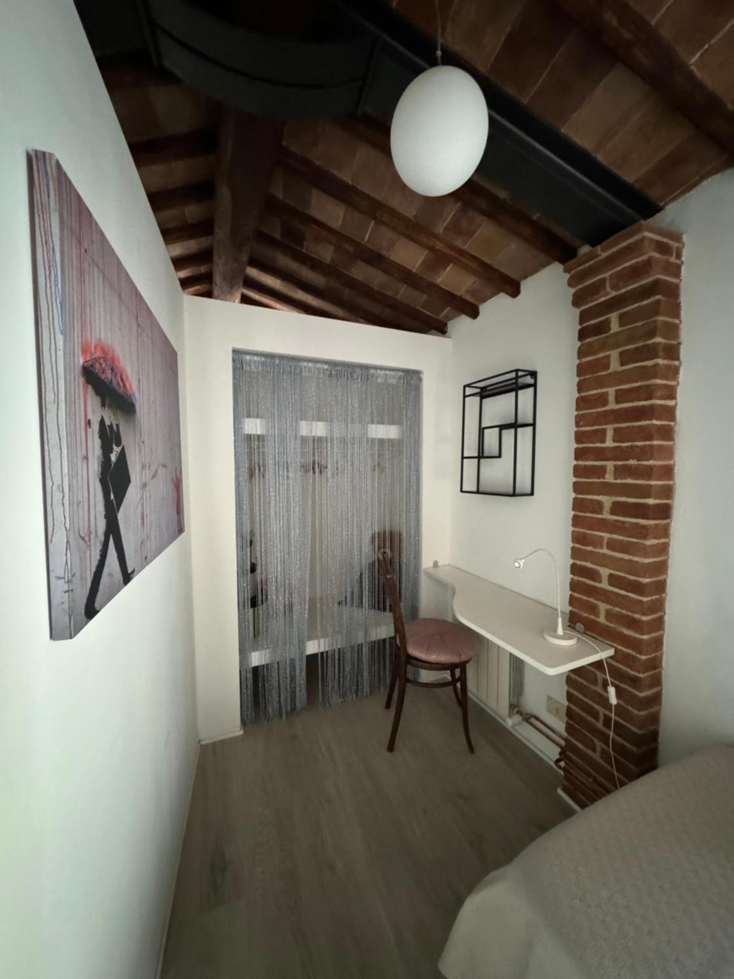 Teresa 91, appartamento incantevole con camino Siena Esterno foto